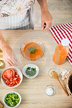 Woman preparing a gazpacho