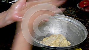 A woman preparing of homemade Turkish flour cookies. Unhealthy lifestyle, nutrition concept. Gaining weight and obesity.