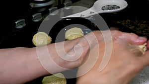 A woman preparing of homemade Turkish flour cookies. Unhealthy lifestyle, nutrition concept. Gaining weight and obesity.