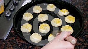 A woman preparing of homemade Turkish flour cookies. Unhealthy lifestyle, nutrition concept. Gaining weight and obesity.