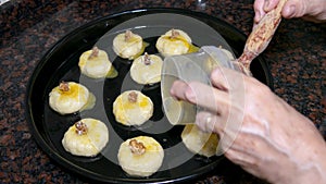 A woman preparing of homemade Turkish flour cookies. Unhealthy lifestyle, nutrition concept. Gaining weight and obesity.