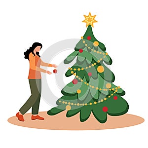 The woman is preparing for the new year. The girl decorates the Christmas tree while standing on the stairs