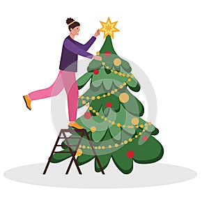 The woman is preparing for the new year. The girl decorates the Christmas tree while standing on the stairs