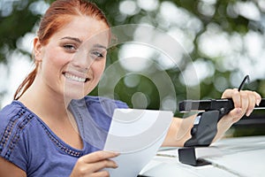 woman preparing roof rack photo