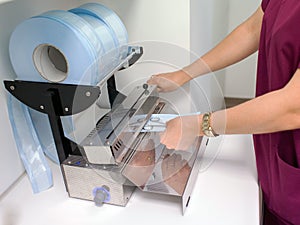 Woman preparing sterilized tools