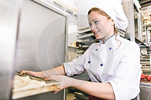 Woman preparing sweet croissants