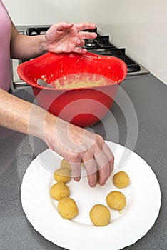 Woman preparing sweets in the kitchen photo