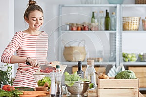 Woman preparing vegetarian meal