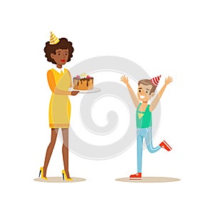 Woman Presenting A Cake To A Boy, Kids Birthday Party Scene With Cartoon Smiling Character