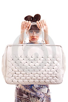 Woman presenting purse photo