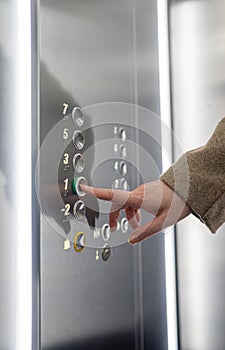 Woman pressing button