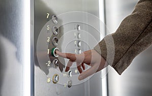 Woman pressing button