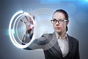 The woman pressing buttons in business concept