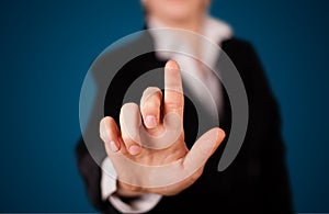 Woman pressing imaginary button