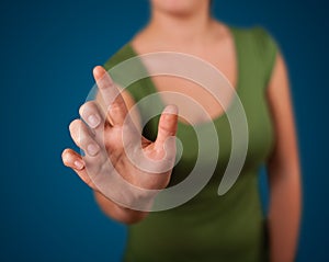 Woman pressing imaginary button