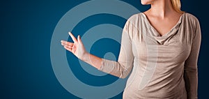 Woman pressing imaginary button