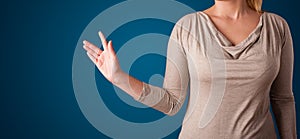 Woman pressing imaginary button