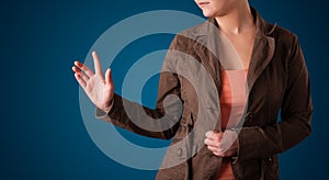Woman pressing imaginary button