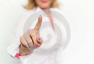 Woman pressing invisible button
