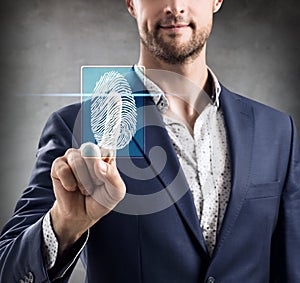 Woman pressing on virtual button with dactyloscopy scanner.