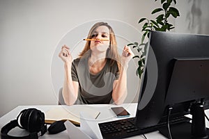 Woman procrastinate at home workplace. Remote work and home office problem
