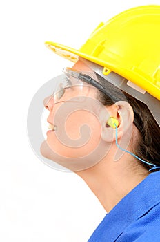 Woman with protective equipment and earplugs