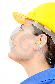 Woman with protective equipment and earplugs