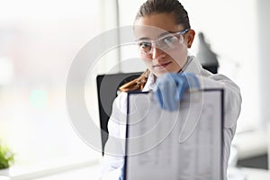 Woman in protective glasses