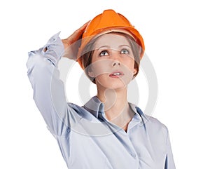 Woman in a protective helmet looking up