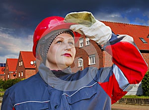 The woman in protective working clothes. labor protection .