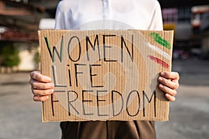 Woman protesting for women`s rights in Iran