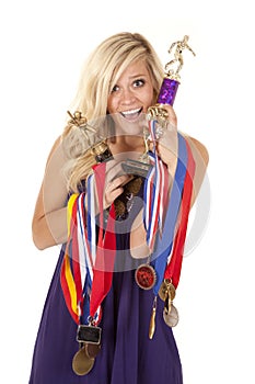 Woman proud of trophies