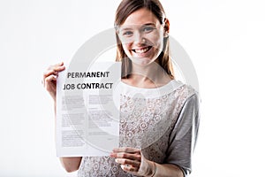 Woman proudly holding her job contract