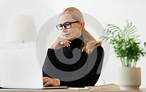 Woman psychologist consulting client online on computer