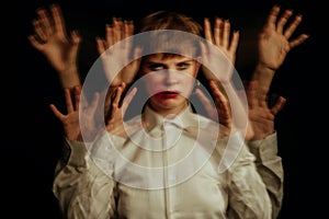 woman is psychopath with schizophrenia and mental disorders. Abstract blurry portrait of a girl with psychosis and panic