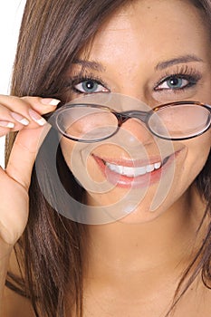 Woman pulling glasses with a gorgeous smile