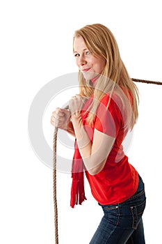 Woman pulling grey rope