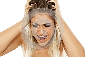 Woman pulling her hair