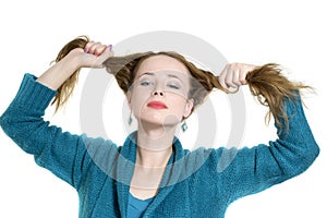 Woman pulling her hair