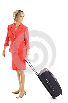 Woman pulling luggage on white