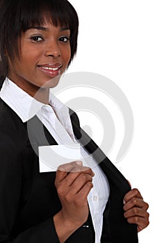 Woman pulling out a business card