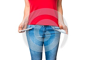 Woman pulling out empty pockets isolated on white
