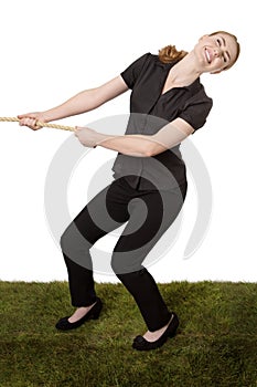 Woman pulling a rope tug of war