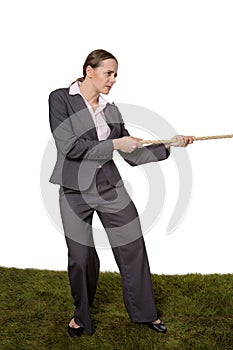 Woman pulling a rope tug of war