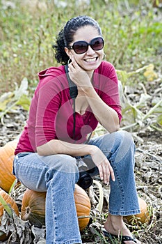 Woman in a Pumpkin patch