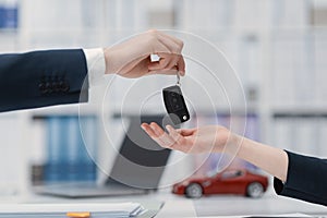 Woman purchasing a new car