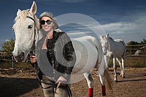 Woman with purebred horse