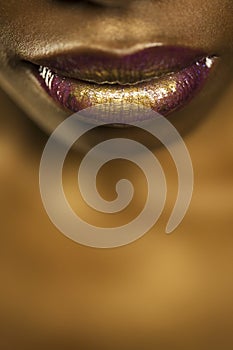 Woman With Purple And Gold Lipstick