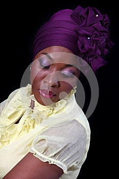 Woman with purple headscarf