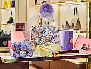 Woman purses in a store in Taormina, Sicily, Italy